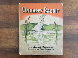 Unhappy Rabbit by Nancy Raymond with Pictures by Frank Harper