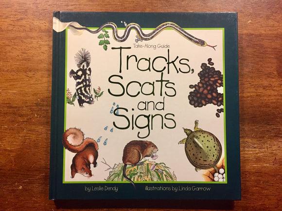 Tracks, Scats and Signs (A Take-Along Guide) by Leslie Dendy, Illustrated by Linda Garrow, Hardcover Book