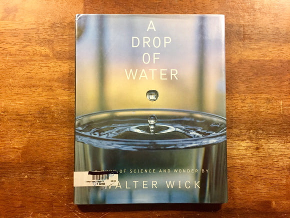 A Drop of Water: A Book of Science and Wonder by Walter Wick, Hardcover Book with Dust Jacket in Mylar, Phot Illustrations