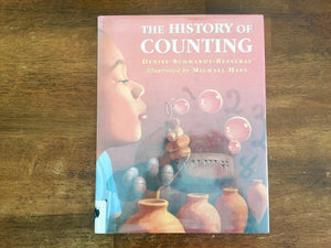 The History of Counting by Denise Schmandt-Besserat, Illustrated by Michael Hays, Hardcover Book with Dust Jacket